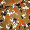 Viskosestoff braun mit Blumen- und Vögel-Print rot-weiß-schwarz