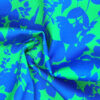 Bekleidungsstoff, Baumwollstretch, Blätterranken blau auf grün