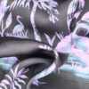 Originalstoff Burda Style, Viskosestoff schwarz mit Palmenlandschaft blau-violett
