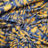 Originalstoff hilco, Scuba-Jersey mit Batikprint blau-ocker