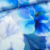 Stoffe Meterware, Jersey, große Blumen, Blau-, Violett- und Grüntöne