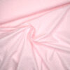 Baumwollstoff rosa mit eingewebten weißen Punkten (Plumeti)