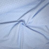 Zarter Baumwollstoff hellblau mit eingewebten weißen Punkten (Plumeti)