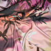 Originalstoff Burda Style 2/2023, Viskosesatin mit großflächigem Palmenprint vor lilafarbenem Sonnenuntergang